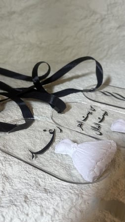 تعلقية العدد 1  فواحه لشنط الدبش شامل الاسم او العباره او الحروف