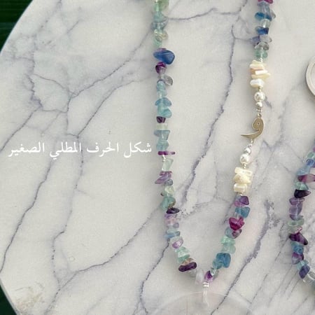 تعليقة جوال حجر اخضر فاتح