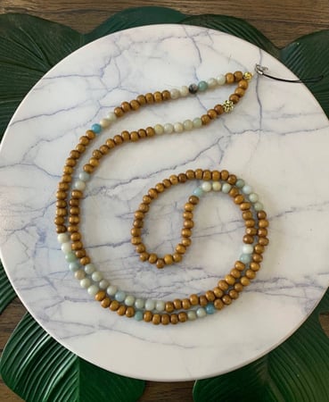 تعليقه جوال خشب مع خرز طبيعيِ ( بودي كروس )