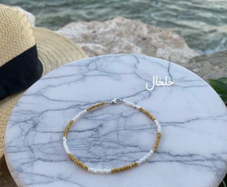 خلخال او اسواره خرز ذهبي وابيض