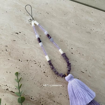 تعليقه جوال هدب بنفسجي