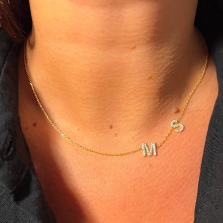 قلادة حرفين أنيق  مرصع بالزركون