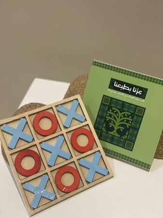لعبه X و O بثيم اليوم الوطني