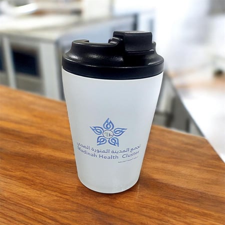 كوب القهوة المقاوم للحرارة ( تجمع المدينة الصحي ) اللون الأبيض