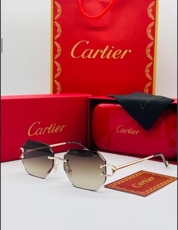 نظارة شمسية إطار ذهبي وعدسات بنية تصميم فرنسي