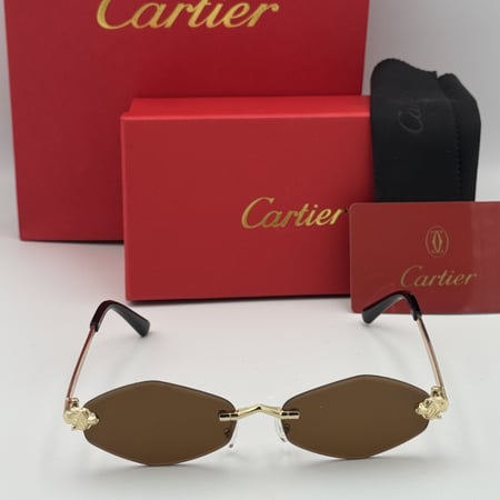 نظارة كارتير معّين بدون اطار عدسة بُنية