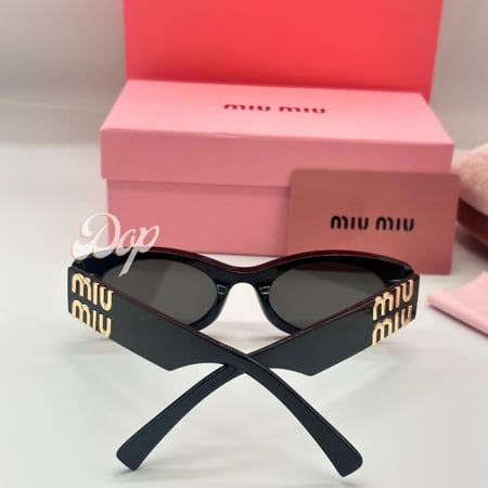 نظارة ميو ميو أسود و ذهبي مستديرة