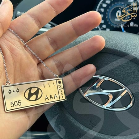 تعليقة سيارة لوحة مع شعار