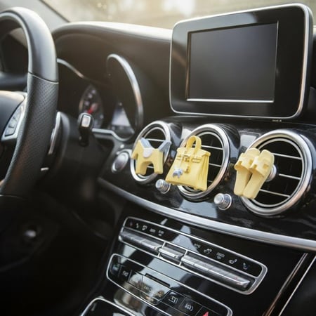 اكسسوارات سياره نسائيه فواحه حجريه صفراء شكل ايرمز من ماركه دوسيه