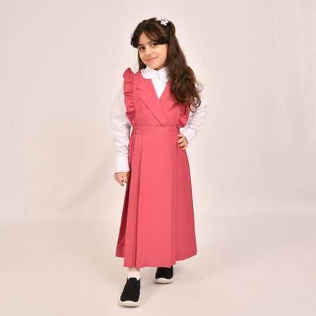 مريول ابتدائي وردي فاتح بكشكش عريض على الاكتاف وكسرات من الاسفل