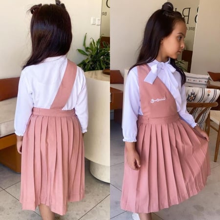 مريول مدرسي ابتدائي تطريز بالاسم