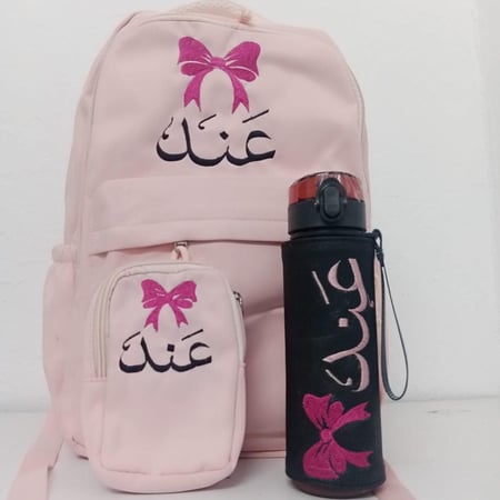 شنط مدرسية لون وردي كتابة بالاسم من متجر فرح