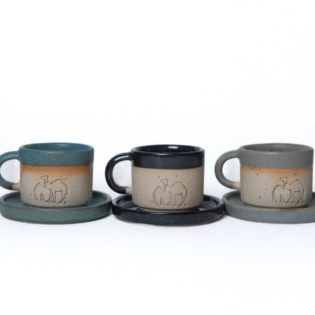 كوب مع صحن عام الابل