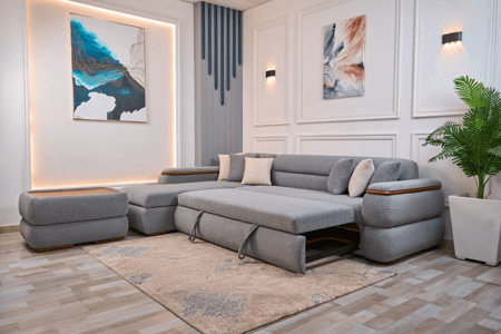 كنبة مودرن حرف L مع سحّاب تخزين وبف خشبي – كنب أنيق ومريح للصالات