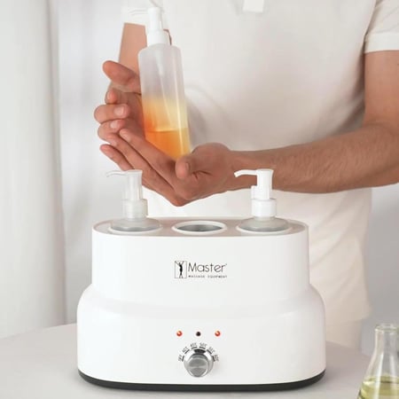 جهاز تدفئة زيوت المساج بثلاث عبوات من صالون سيستم