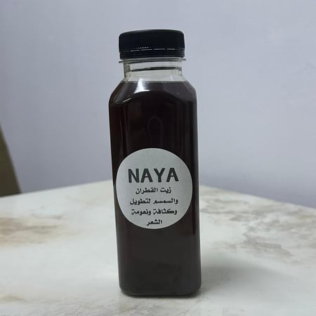 زيت القطران والسمسم الخام لتطويل الشعر وكثافته ونعومته