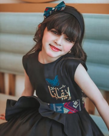 فستان الفراشه بالاسم