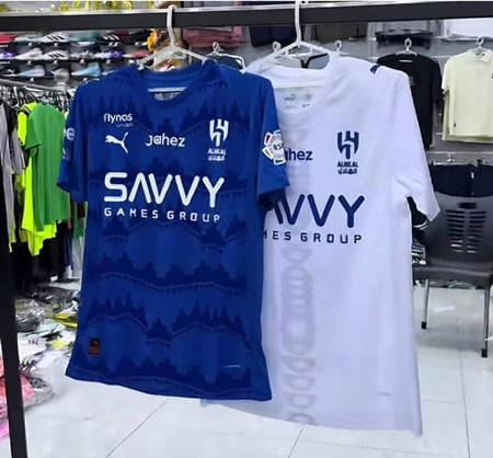 تيشرتات الهلال الازرق و الابيض
