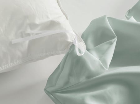 تلبيسة لحاف السرير