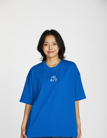 تيشيرت واسع بشعار عزف - كلاسيك  أزرق