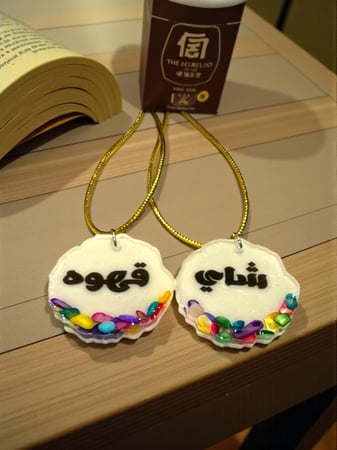 تعليقة ترامس الاحجار الملونه (السعر للحبه )