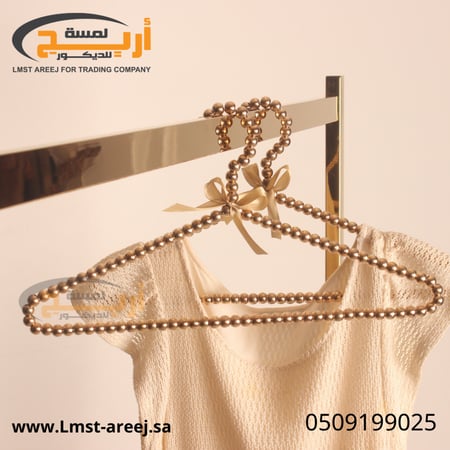 علاق ملابس لولو ذهبي