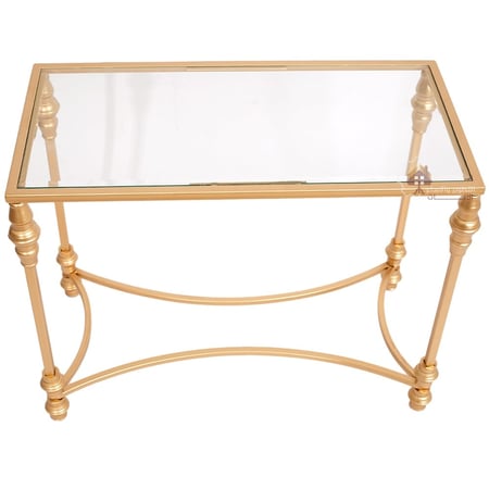 طاولة جانبية قواعد حديد لون ذهبي وسطح زجاج شفاف