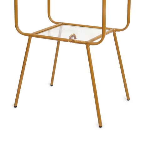 طاولة جانبية دورين قواعد حديد لون ذهبي وسطح زجاج شفاف