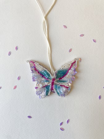 Luminous Flutter Charm