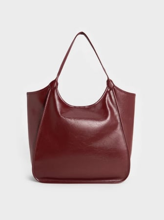 حقيبه باللون البرغندي من تشارلز اند كيث