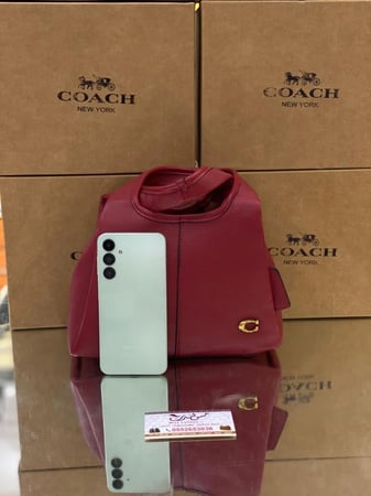 شنطة وسط عنابي 7088
