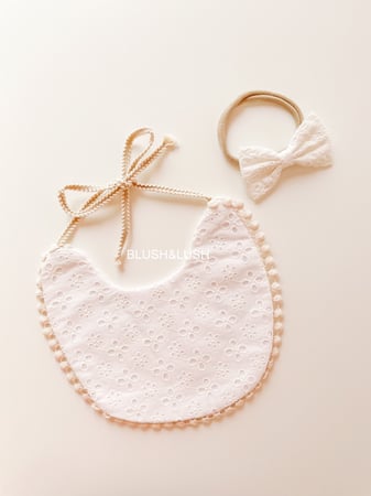 Bib with tassel