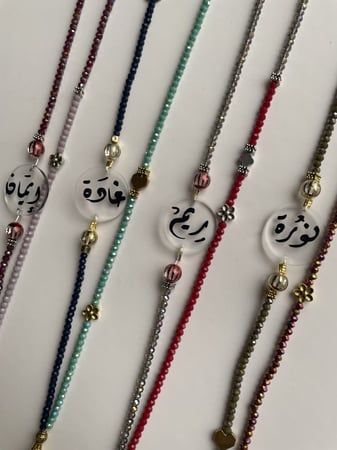 سبحة أحمر ورمادي - خرز لامع