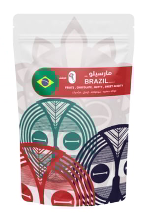 قهوة مارسيلو ٢٥٠ جرام على سطح خشبي