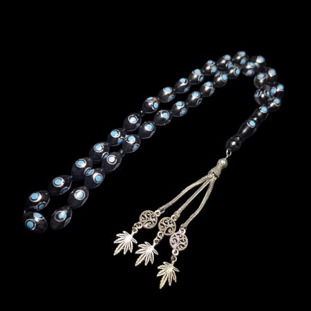 سبحة من خشب الكوك مع كركوشه معدنية