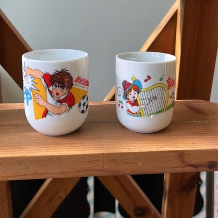 كوب صناعة يابانية فنتج ونادر يحمل رسوم لشخصيات كرتونية