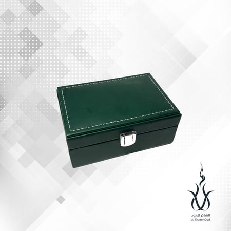 علبه هديه فاخرة - تحتوي على أوقية عود مروكي طبيعي محسن فاخر و ربع تولة مخلط عود فاخر عطري