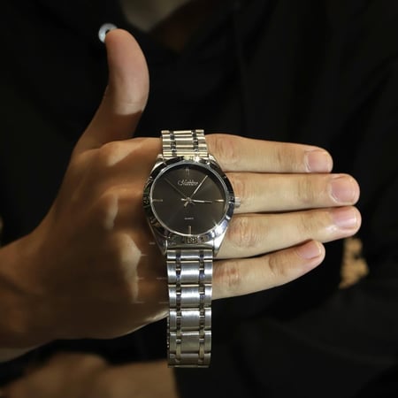 ساعة رجالي ستانلس ستيل فضي مينا أسود