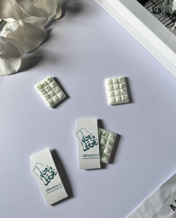 توزيعات شمع فواحة عطري ثيم نحلم ونحقق
