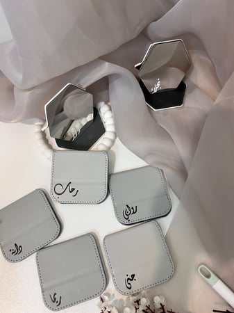 توزيعات مرايا بالاسم