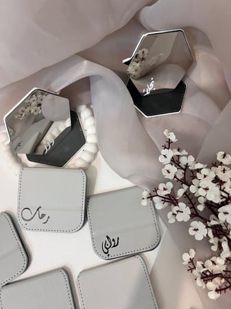 توزيعات مرايا بالاسم