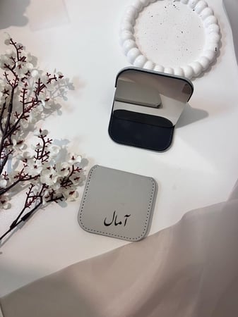 توزيعات مرايا بالاسم