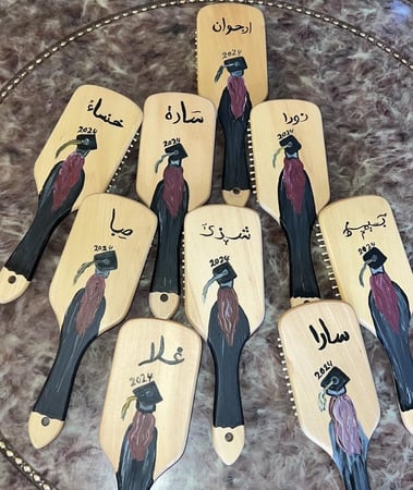 تخرج { فرشاة شعر }