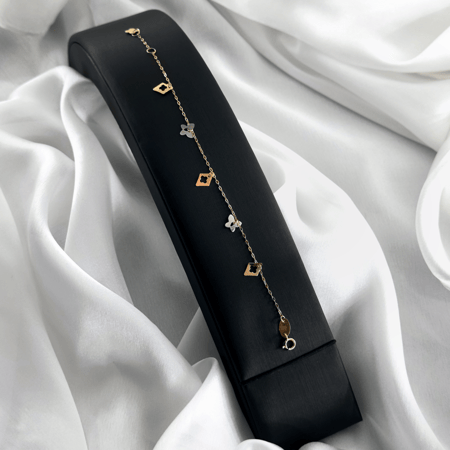 سوارة ذهب اصفر بتصميم انيق مزين بالحلقات الملونة عيار 18