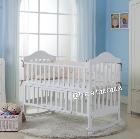 سرير اطفال خشبي 7 في 1 مع ناموسية