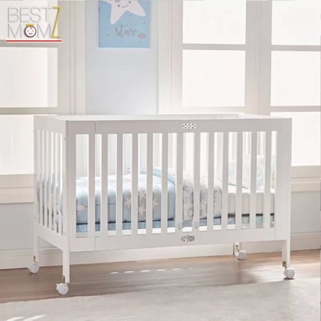 سرير اطفال خشبي قابل للطي