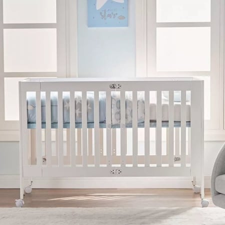 سرير اطفال خشبي قابل للطي