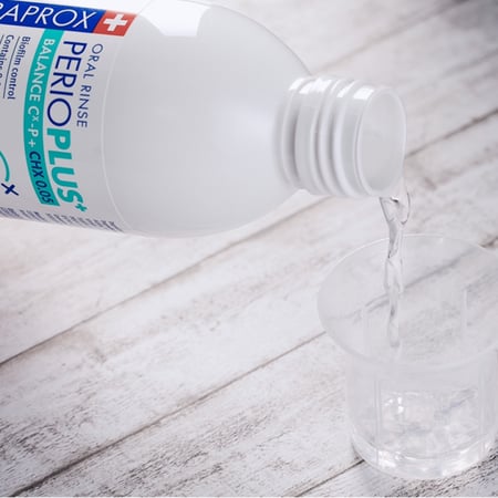 كيورابروكس غسول التهابات اللثه 200ml