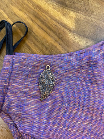 اضافة اكسسوار معدني للكمامة