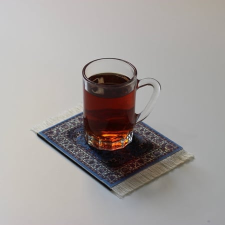 قاعدة كوب سجاد ازرق